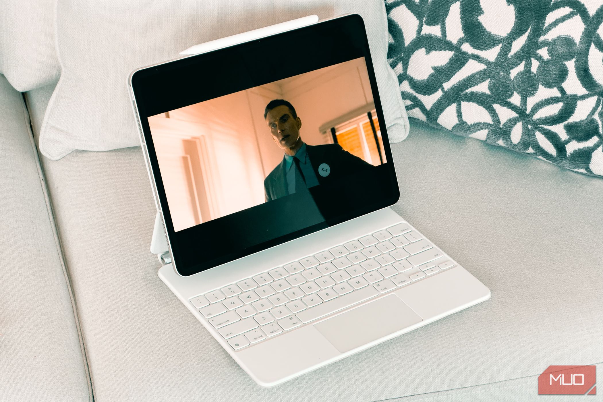 Movie playing on the Apple iPad Air M2 sitting on a couch