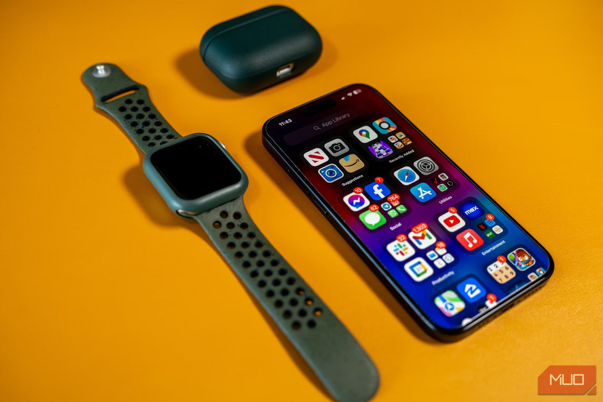 iPHone 15 Pro alongside Apple Watch and AirPods