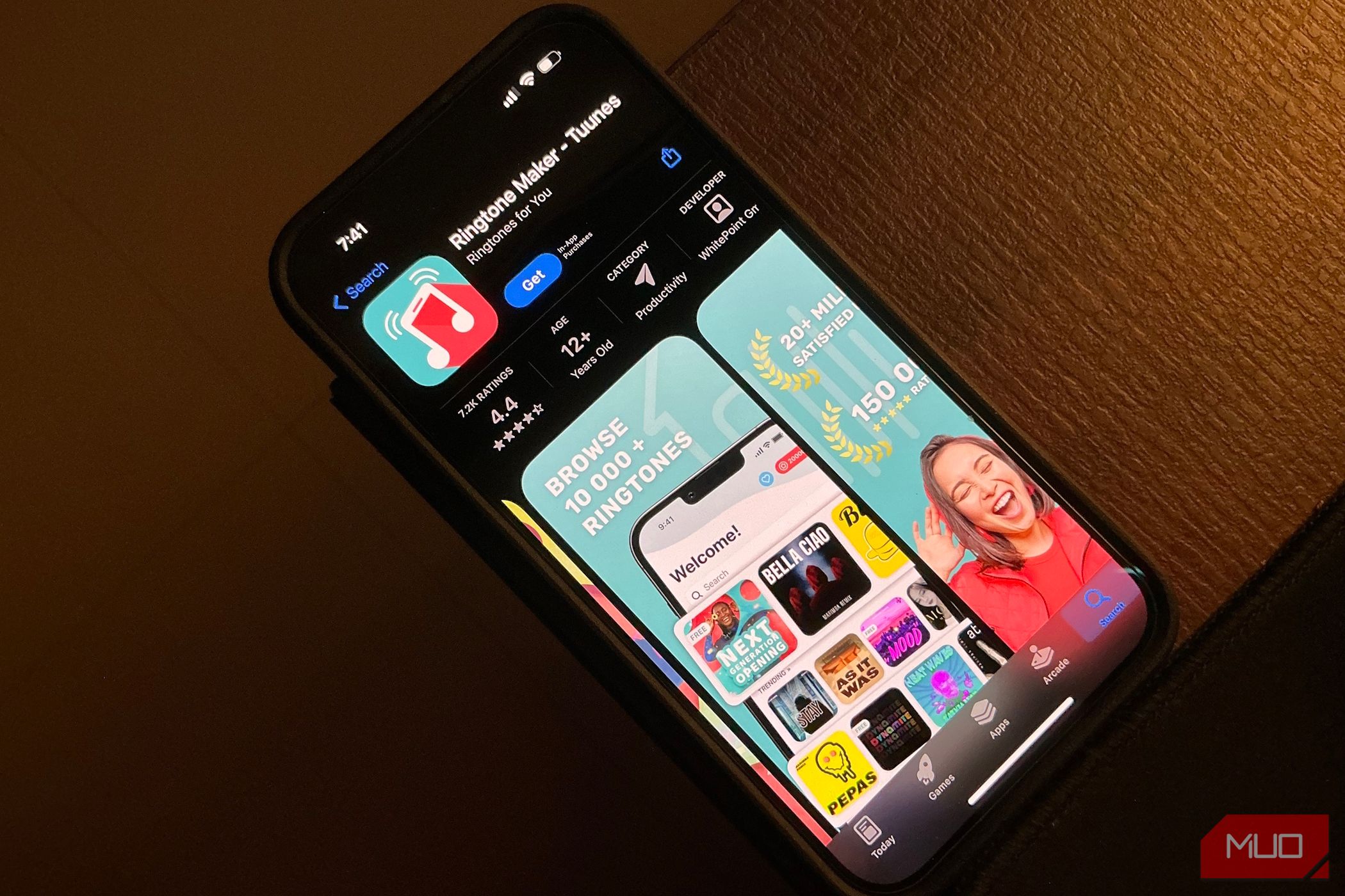 Ringtone app on an App Store shown on an iPhone laying on a desk
