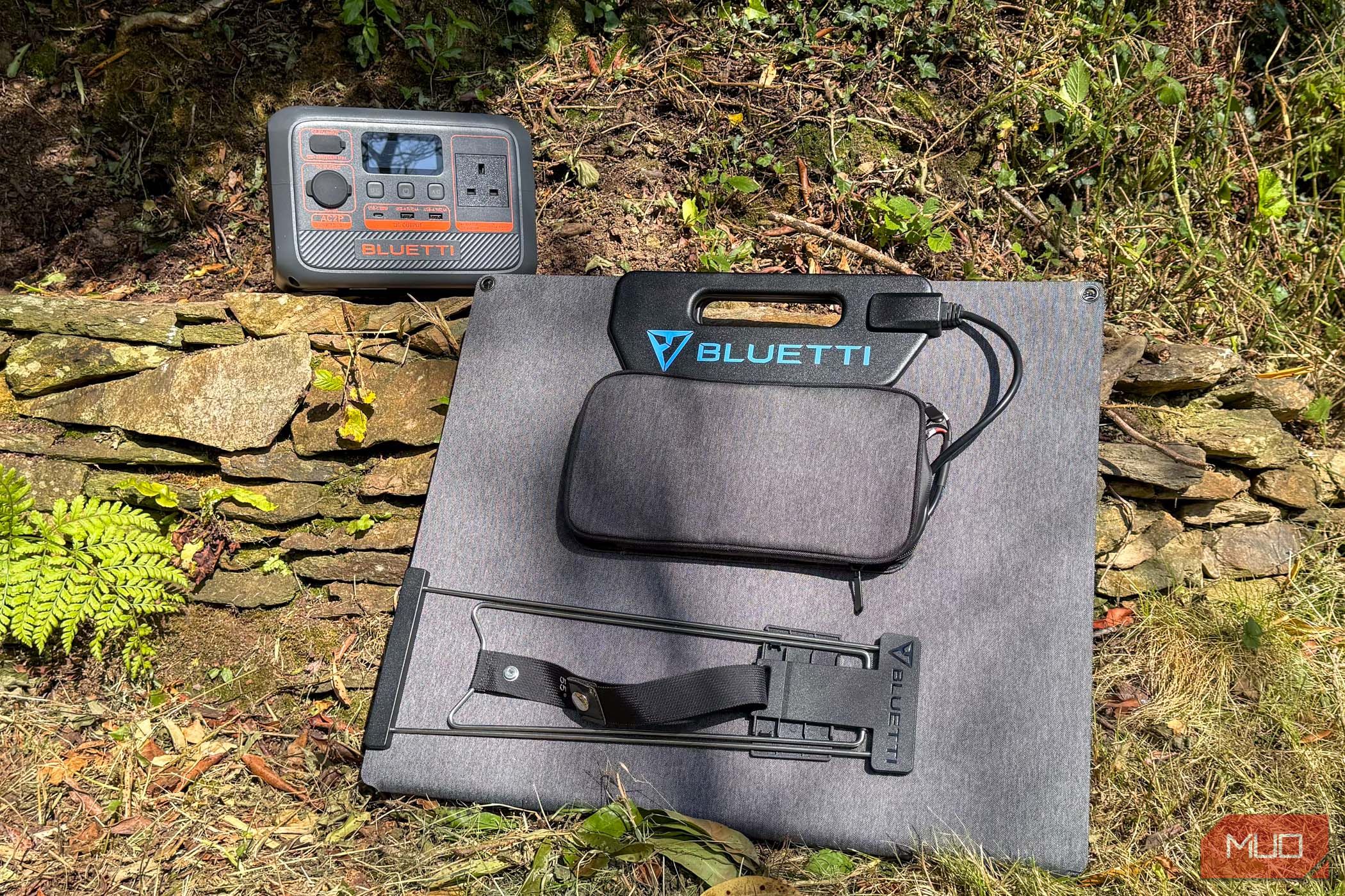 bluetti ac2p and pv120s review - panel and battery outdoors