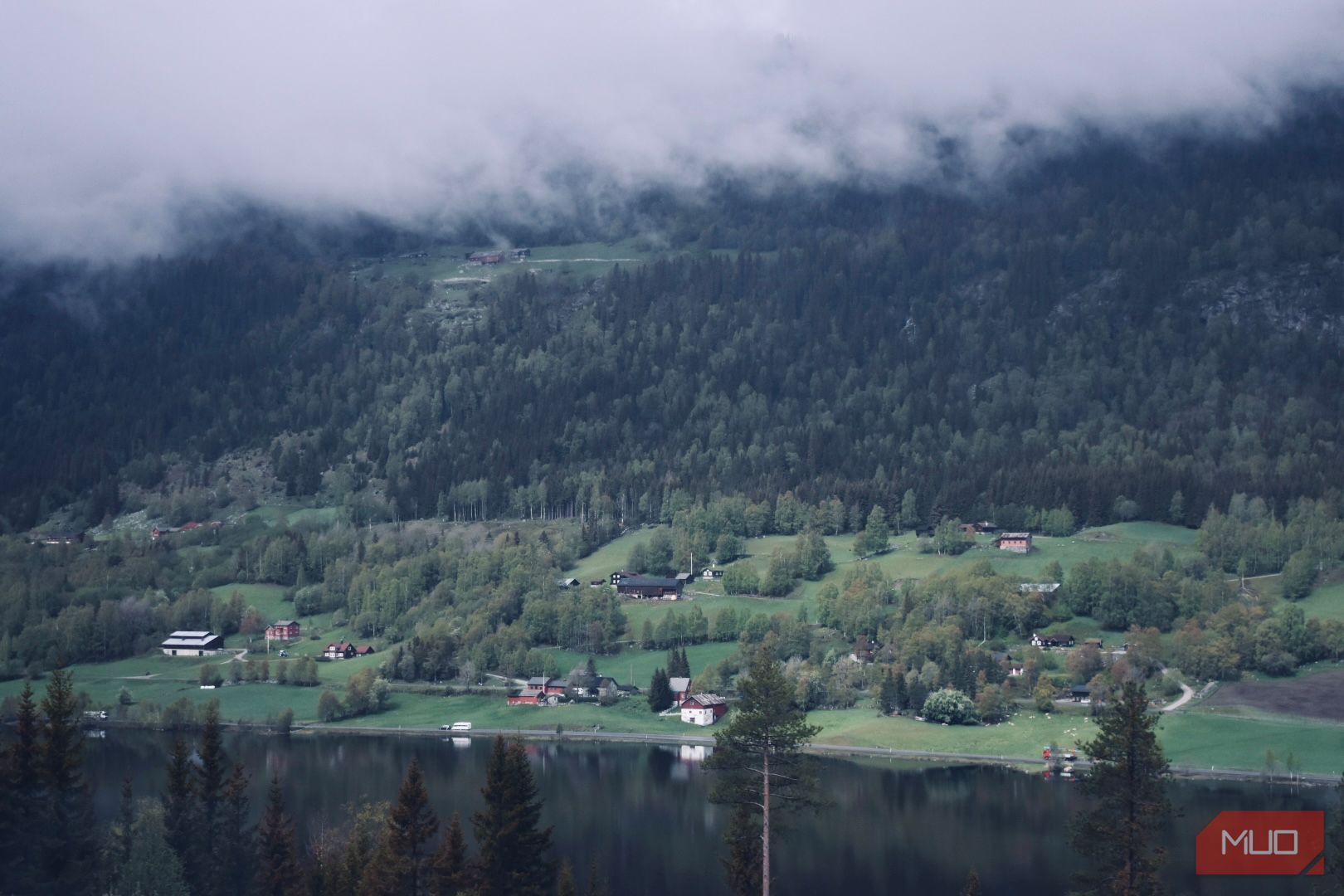 Landscape photo of clouds moving over the mountains