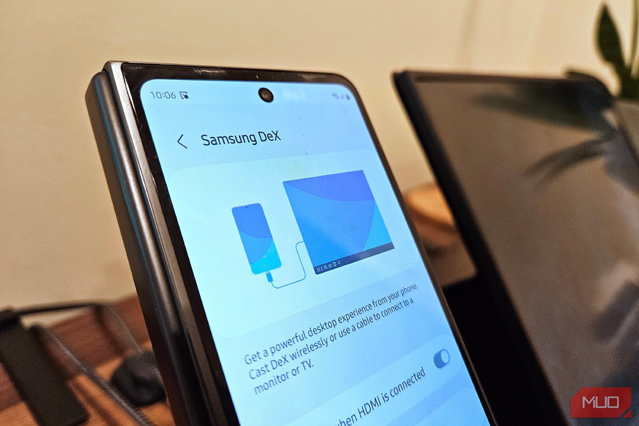 Samsung DeX on a Galaxy Z Fold 5 next to a portable monitor.