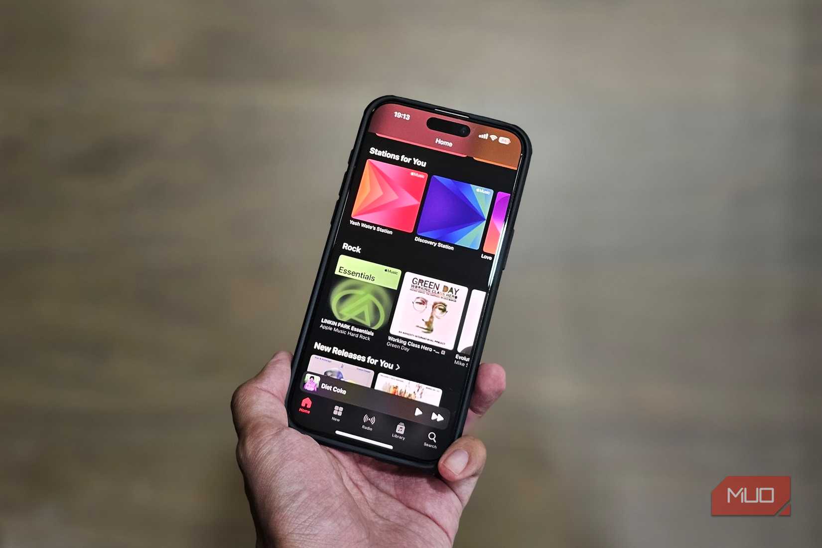 Home tab in the Apple Music app on an iPhone.