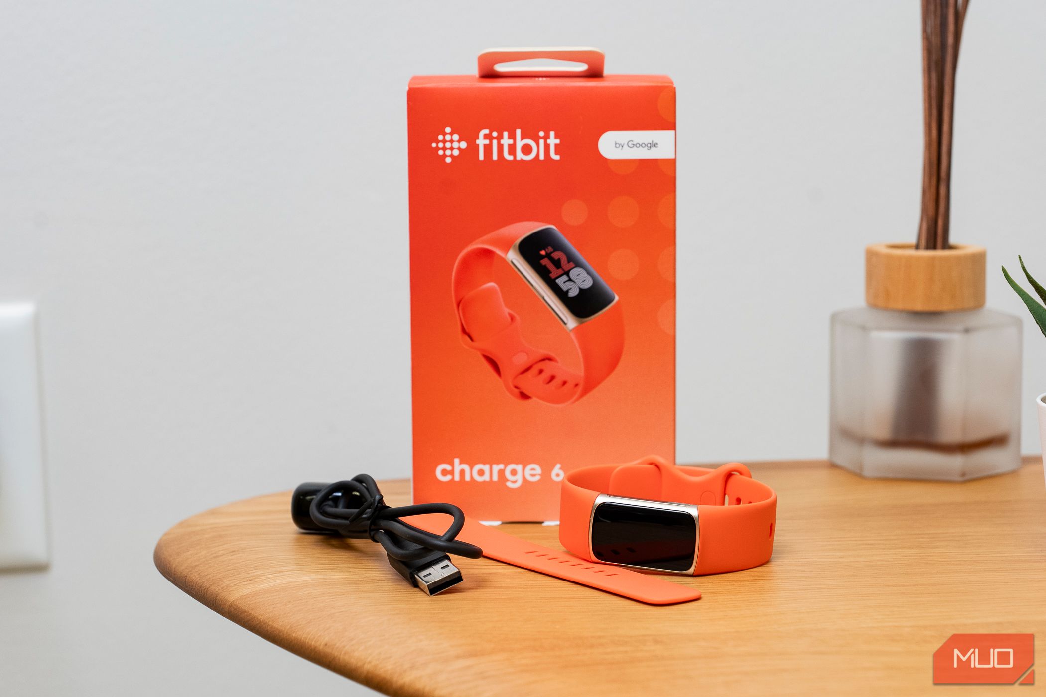 The Fitbit Charge 6 with box on desk