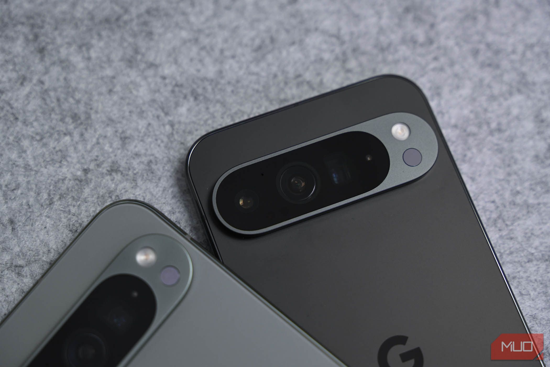 Camera of the Google Pixel 9 Pro XL next to the Google Pixel 9 Pro