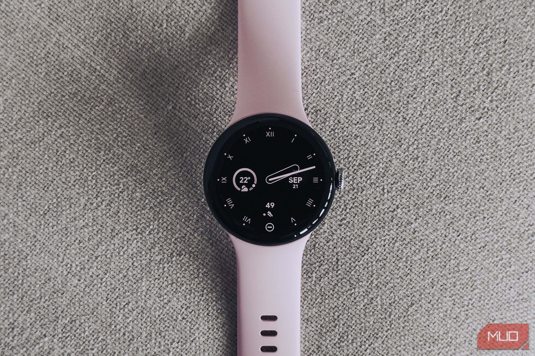 Google Pixel Watch 3 on white fabric surface