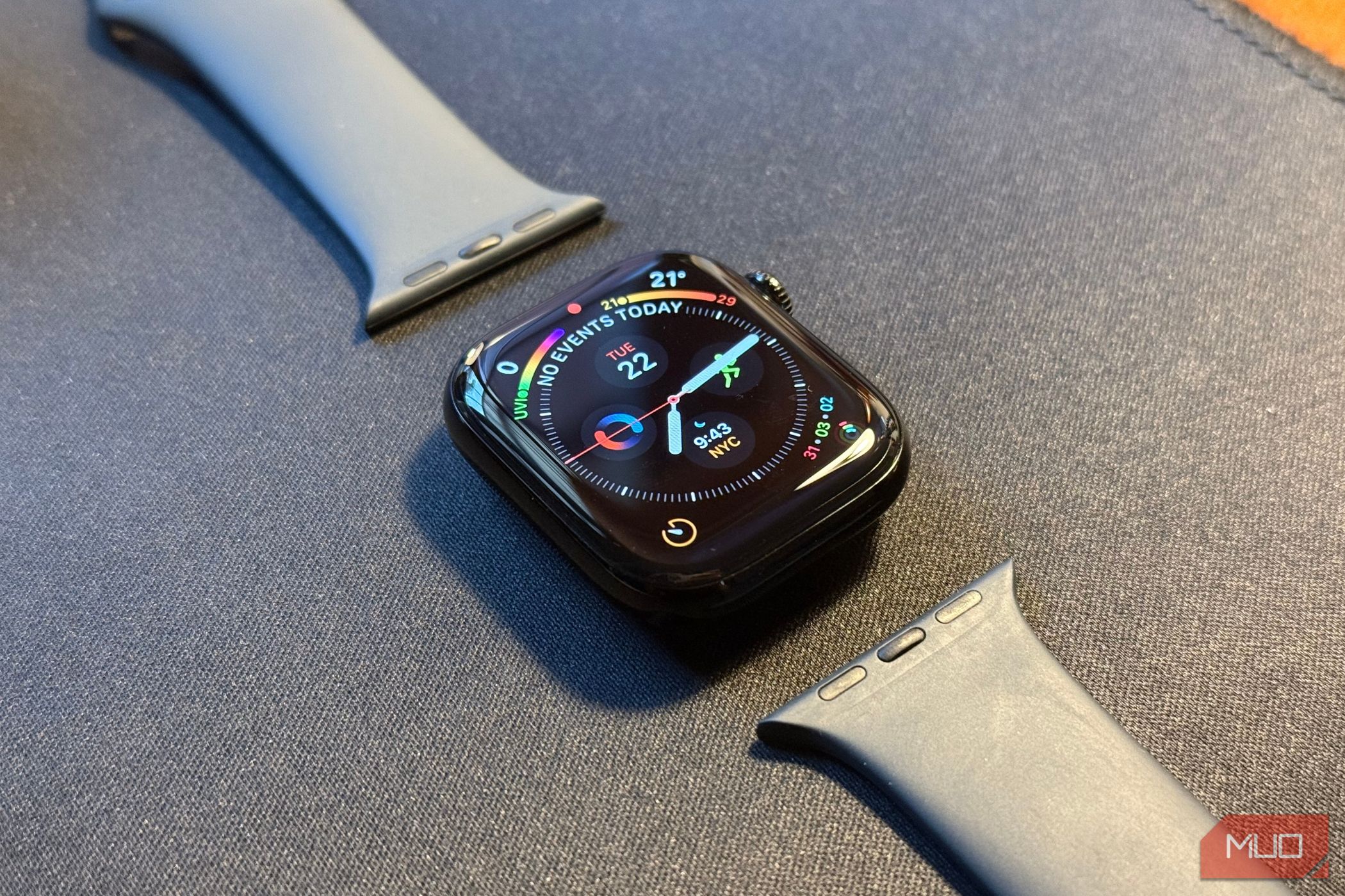 Apple Watch is placed on a table with the sports band removed.