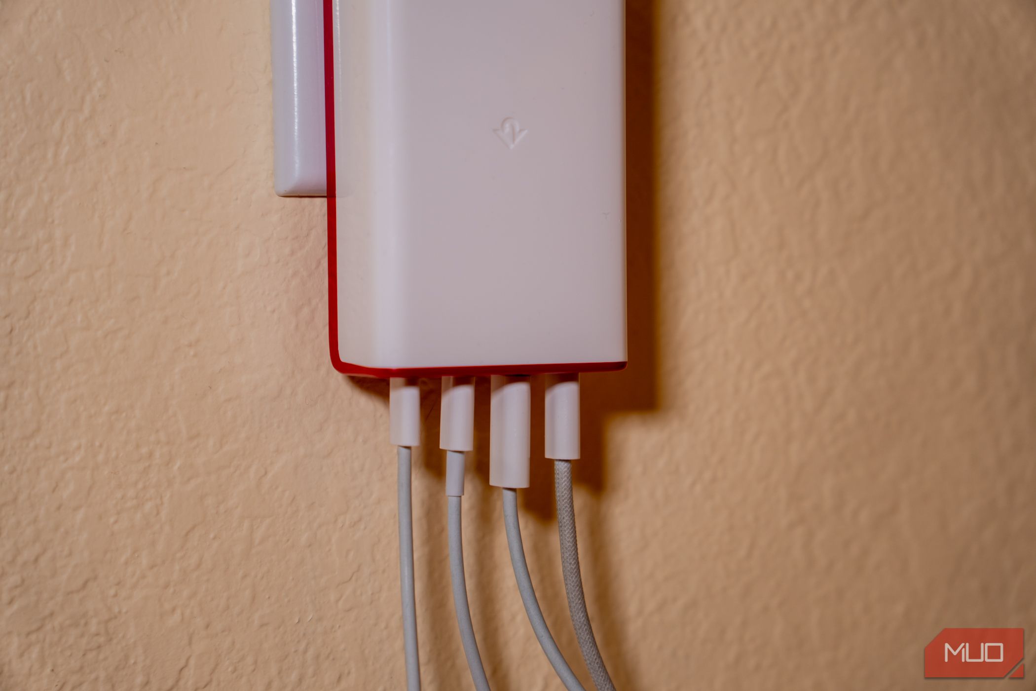 Close-up of the PlugBug 120 connected via cable to all four ports