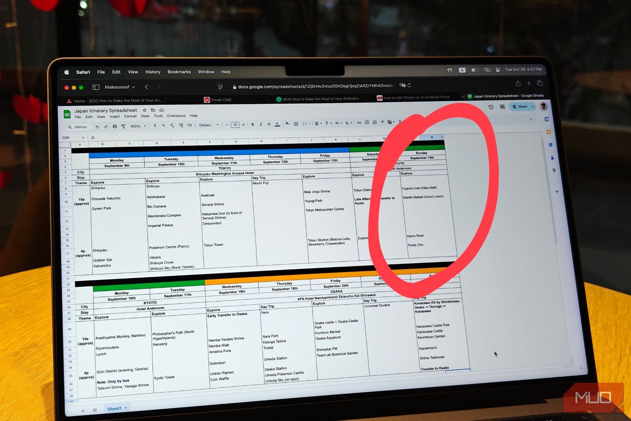 laptop on a table showing a spreadsheet with values marked up via google photos editor