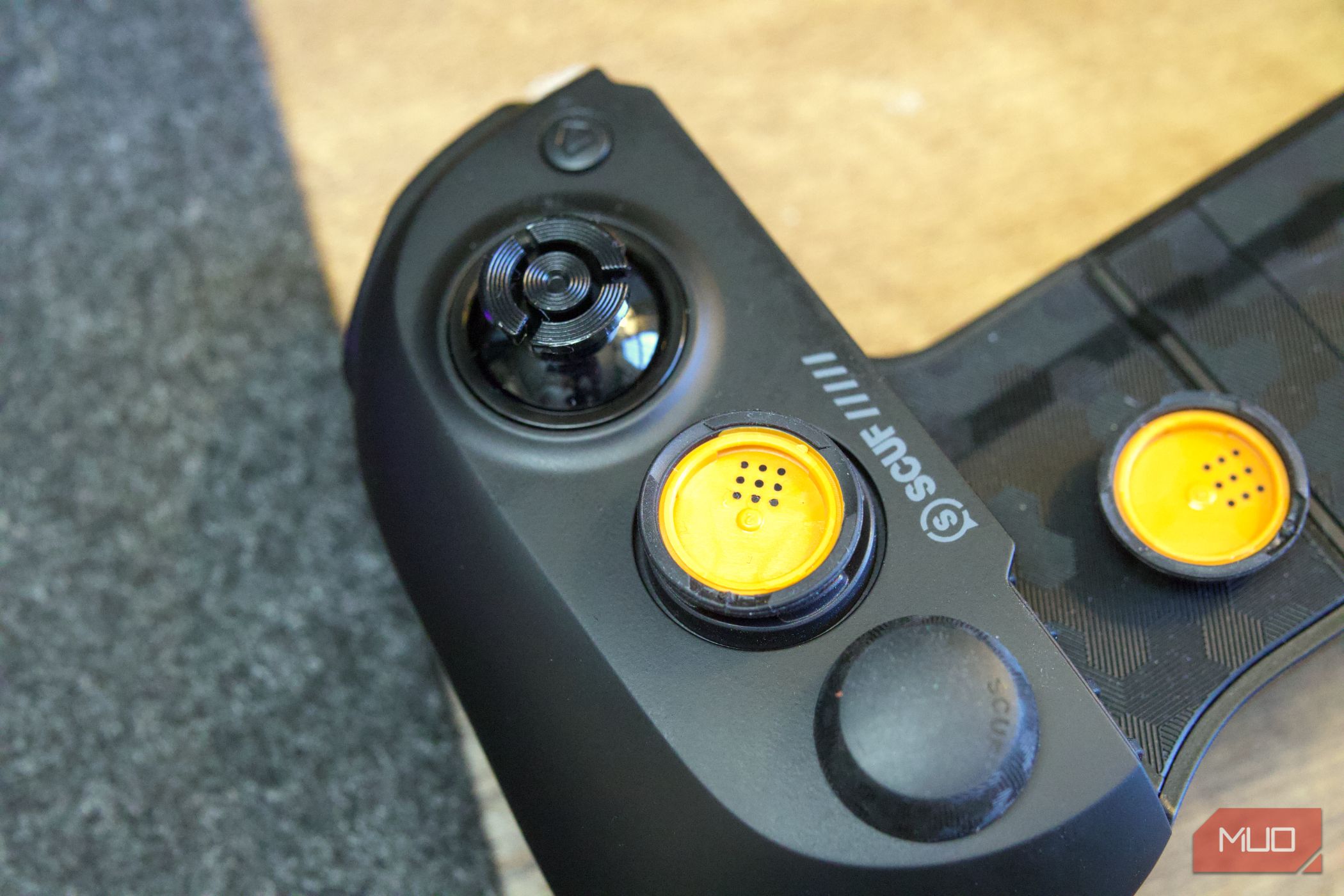 Scuf Nomad Thumbstick Grip Removed and flipped upside down on controller