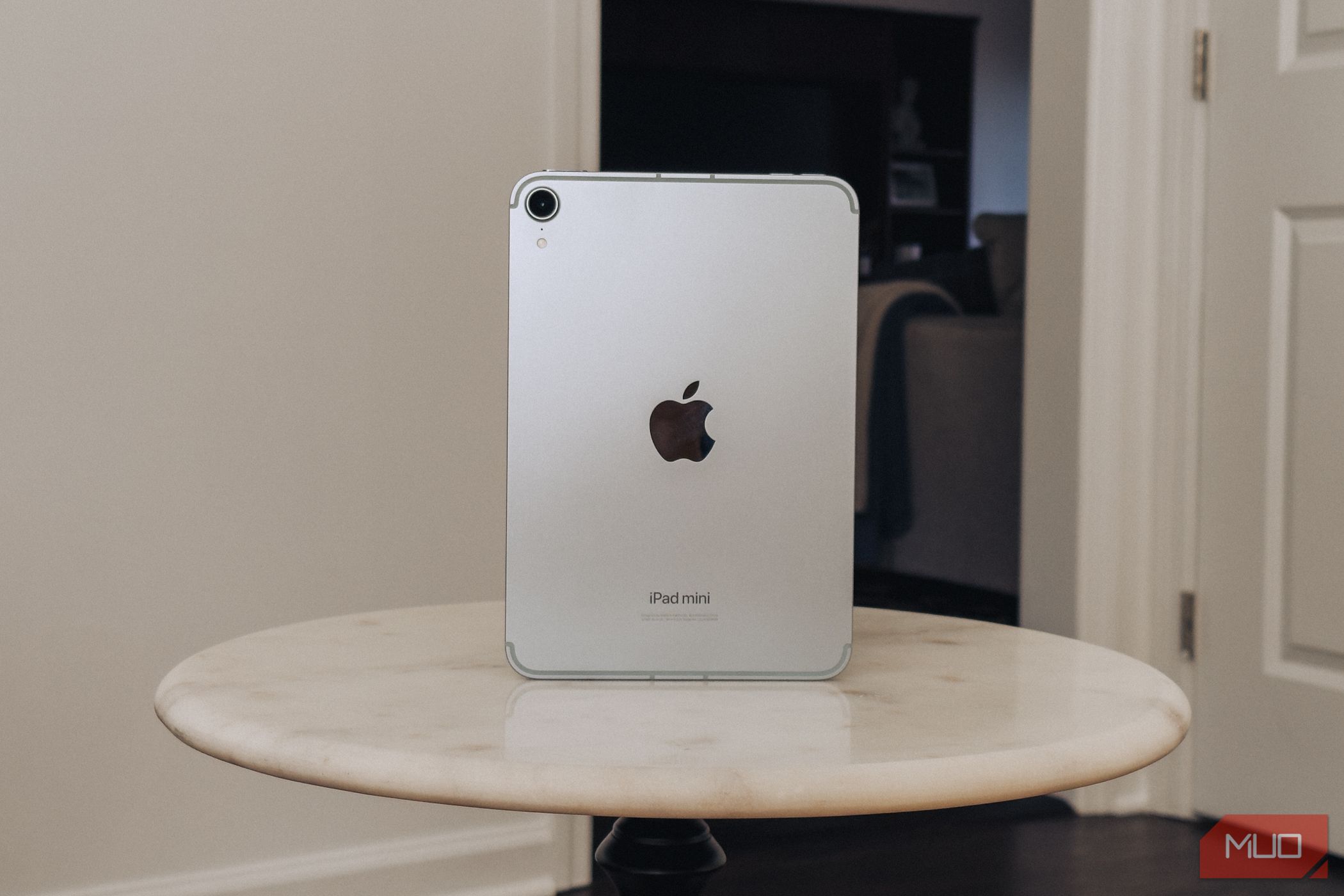 iPad mini (A17 Pro) on marble table in portrait