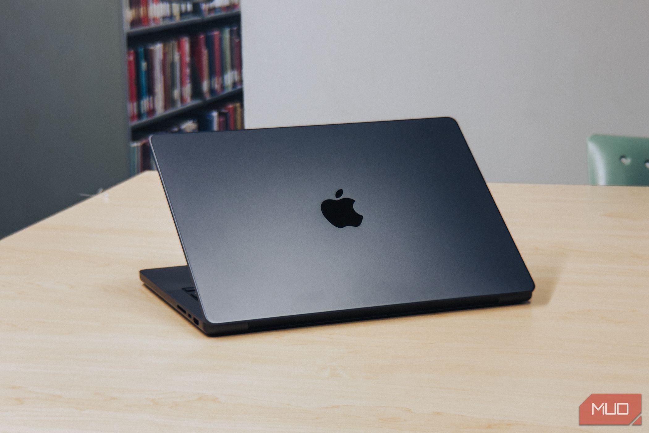 M4 MacBook Pro Space Black finish under light