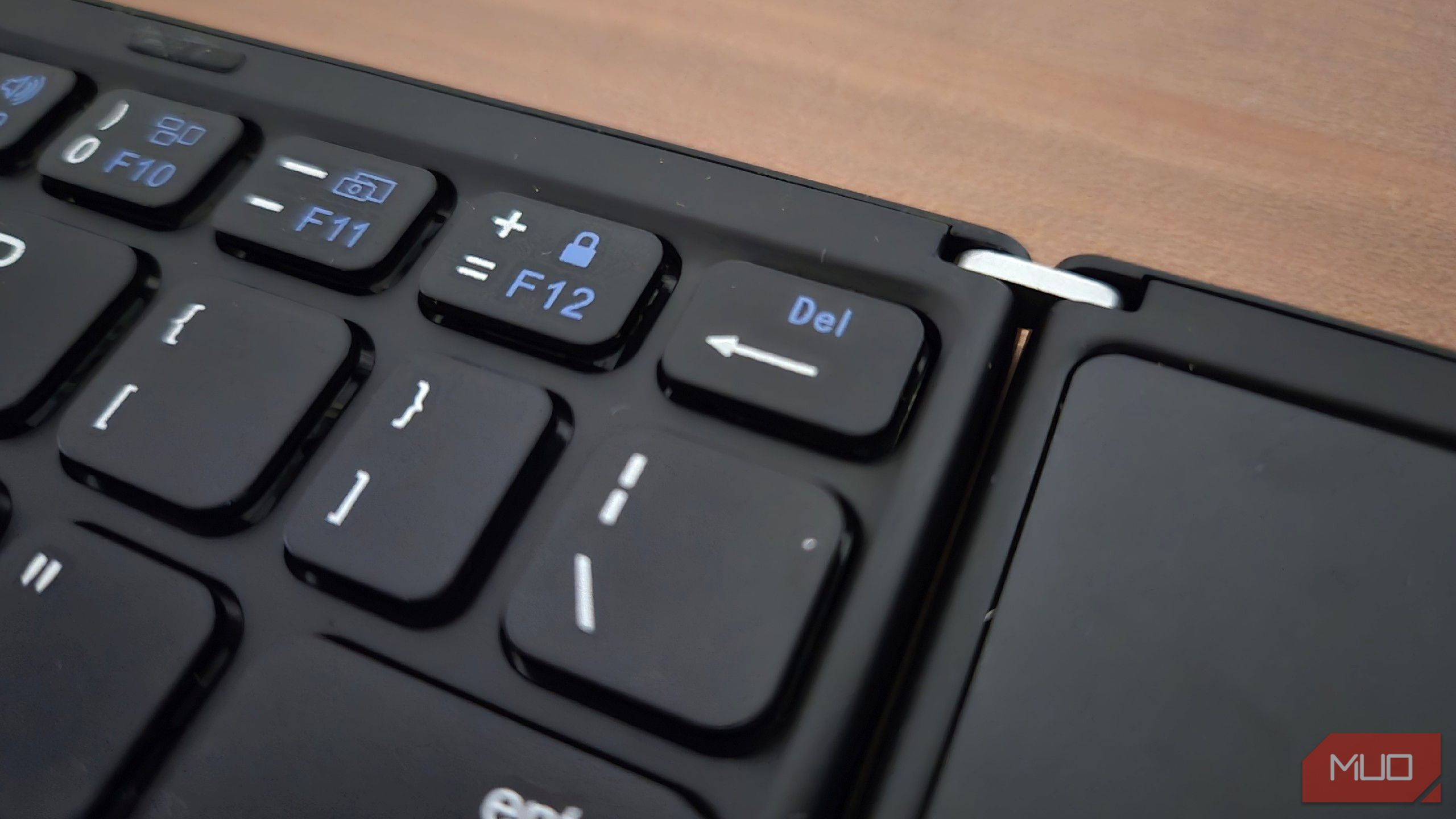 The delete key in a folding Bluetooth keyboard.
