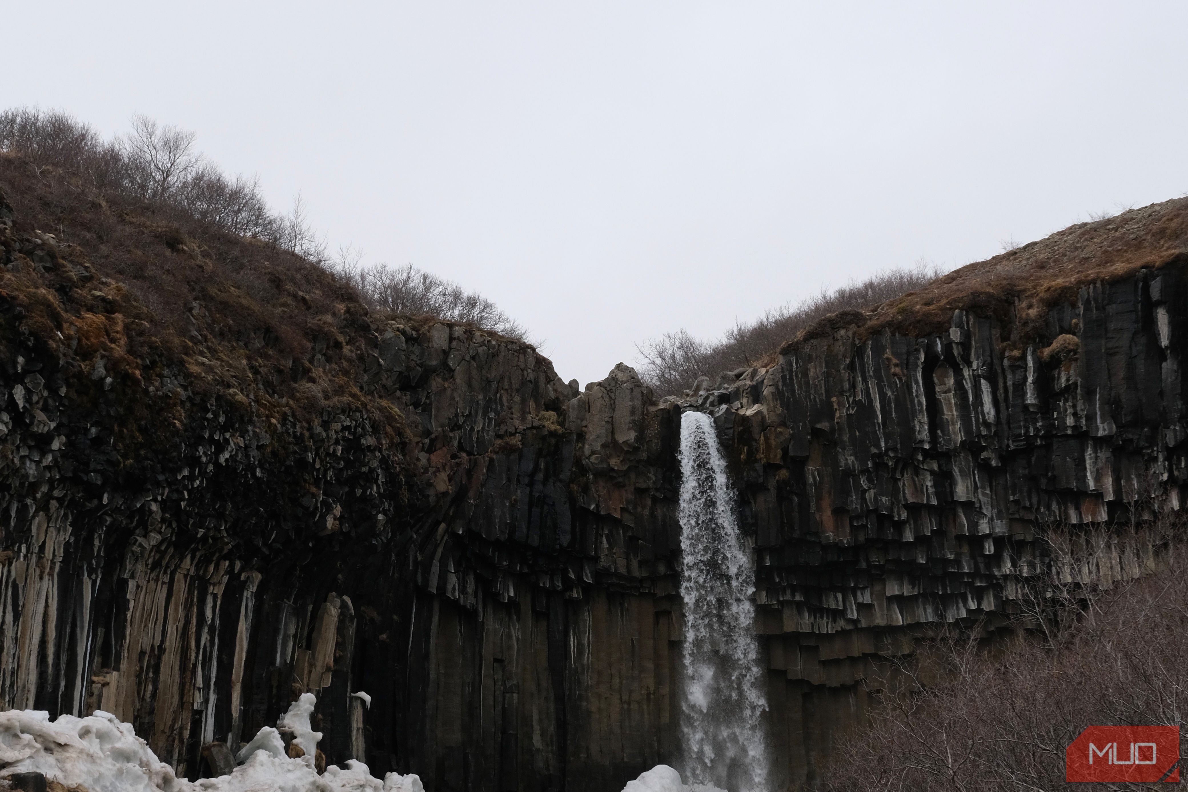 A photo of a waterfall taken on a cloudy day