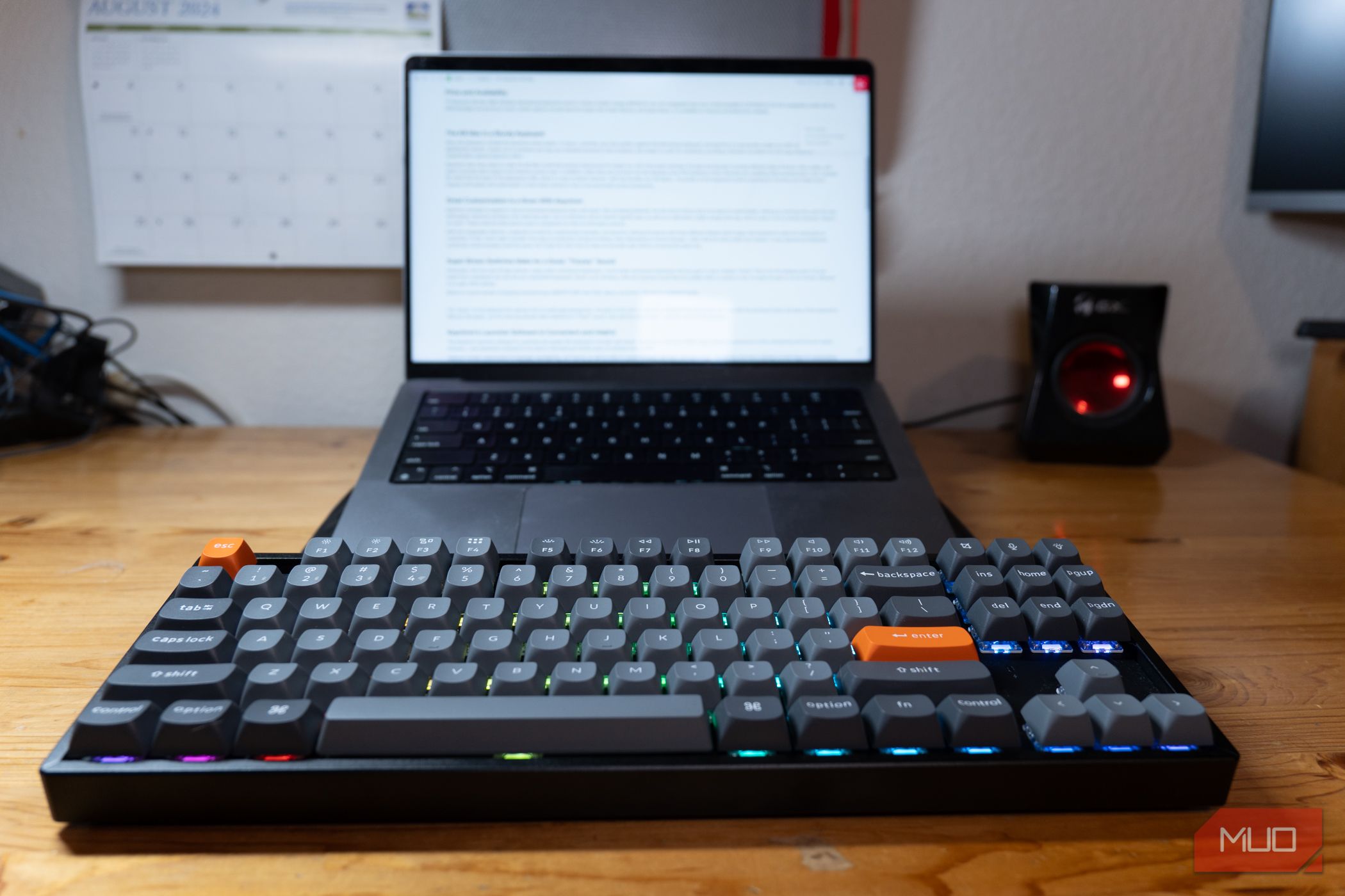 Keychron K8 Max on a desk in front of a MacBook.