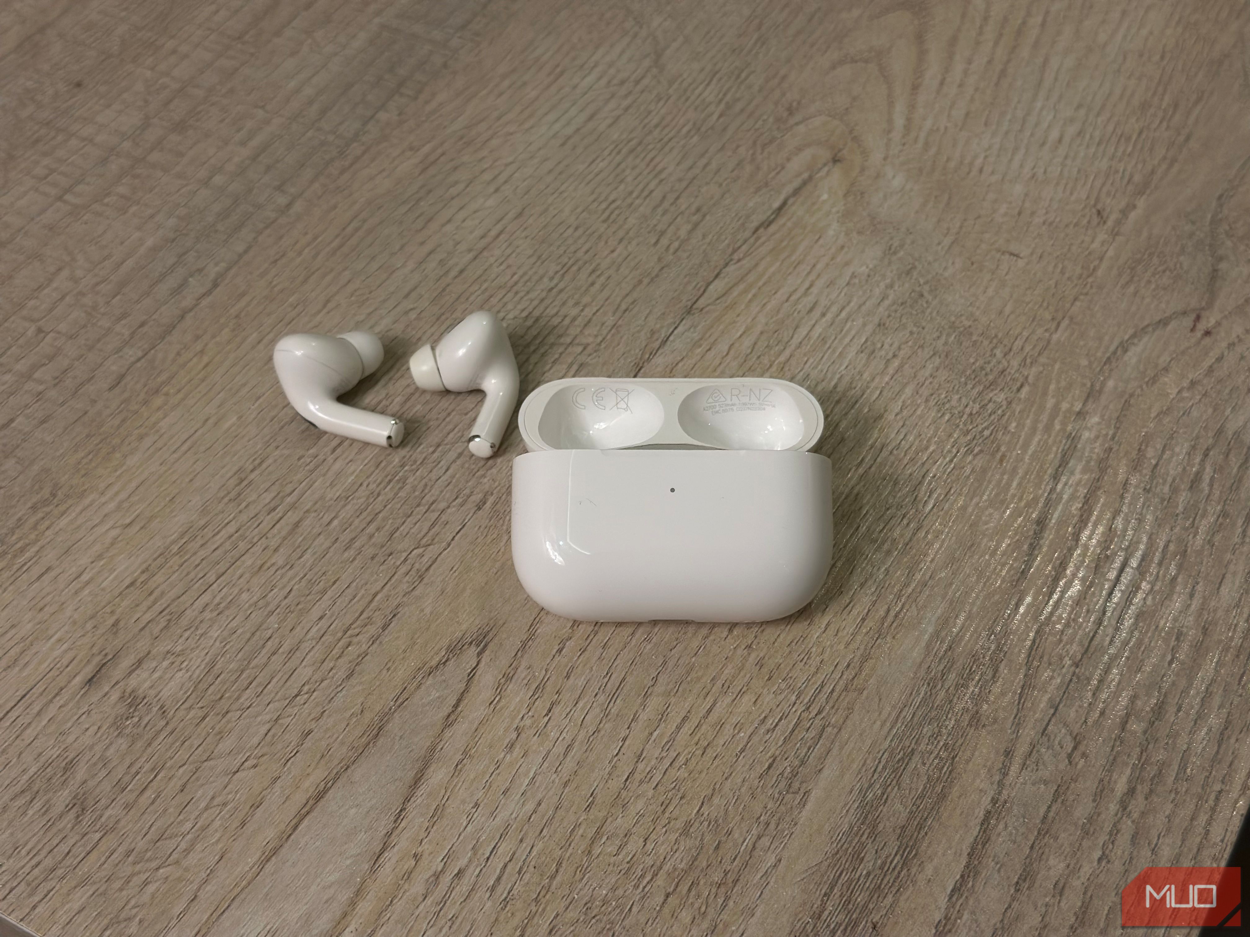 AirPods Charging Case and buds on a table