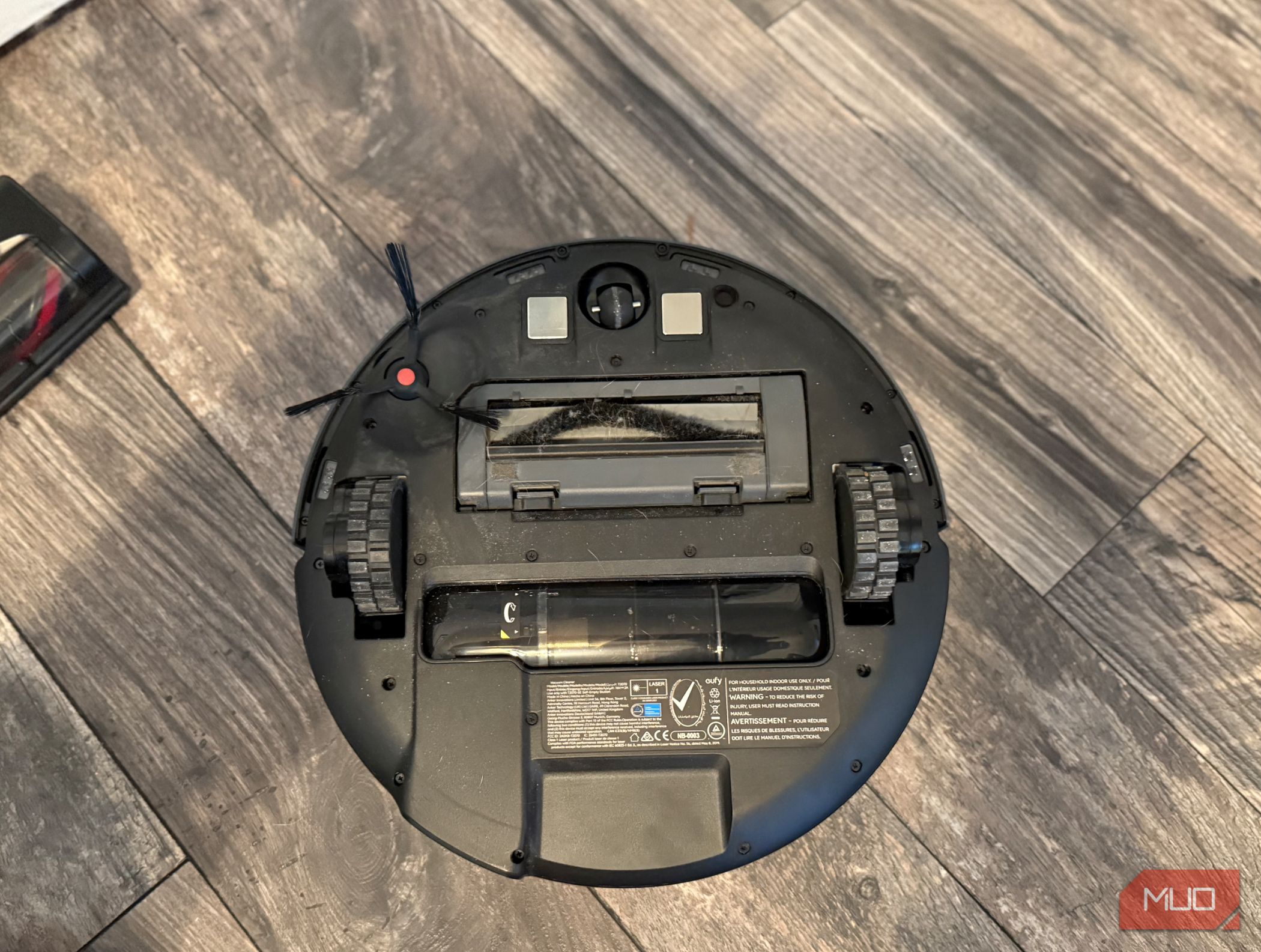 A bottom view of the Eufy e20 robot vacuum. 