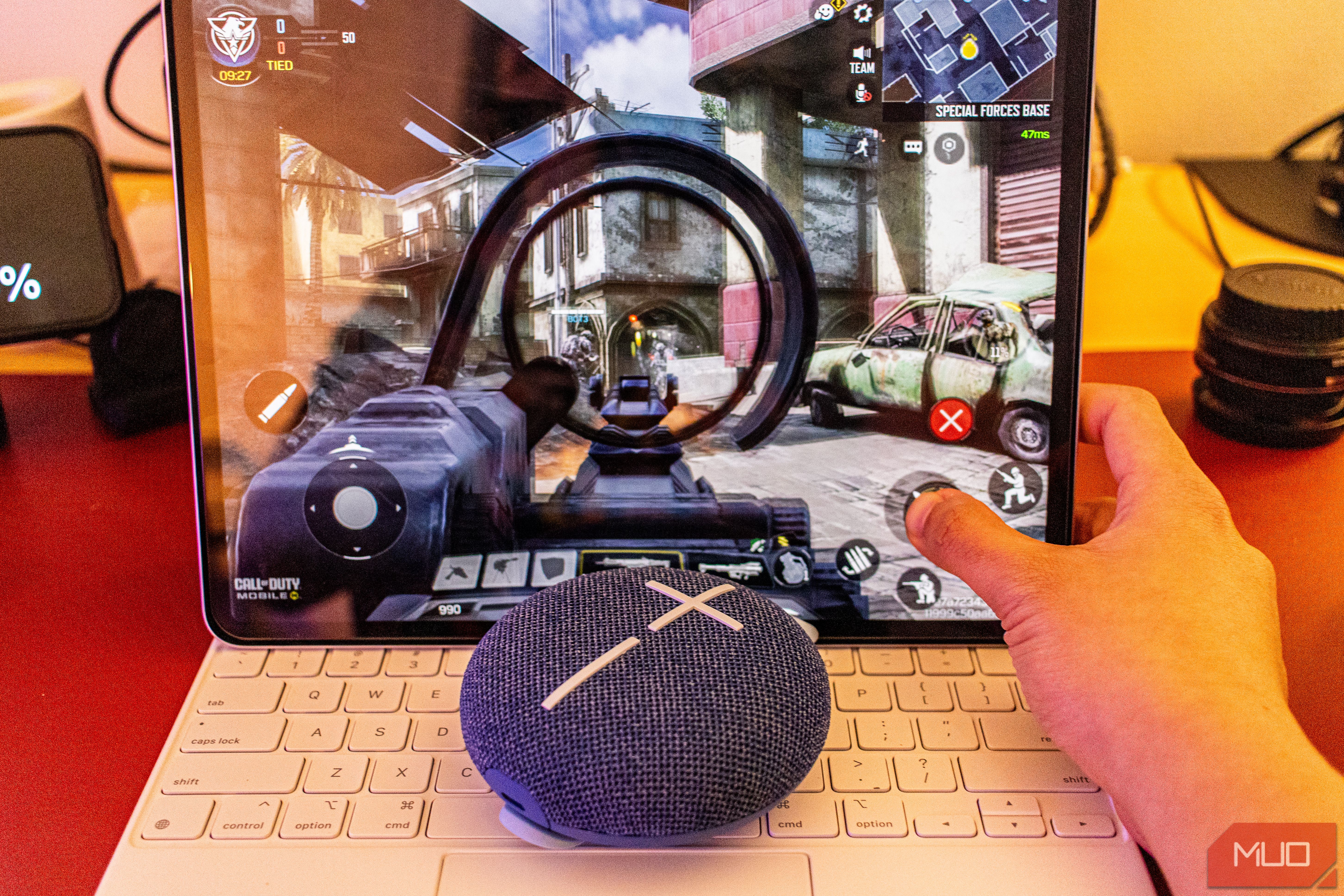 Using the Ultimate Ears Miniroll as a speaker while playing Call of Duty on an iPad.