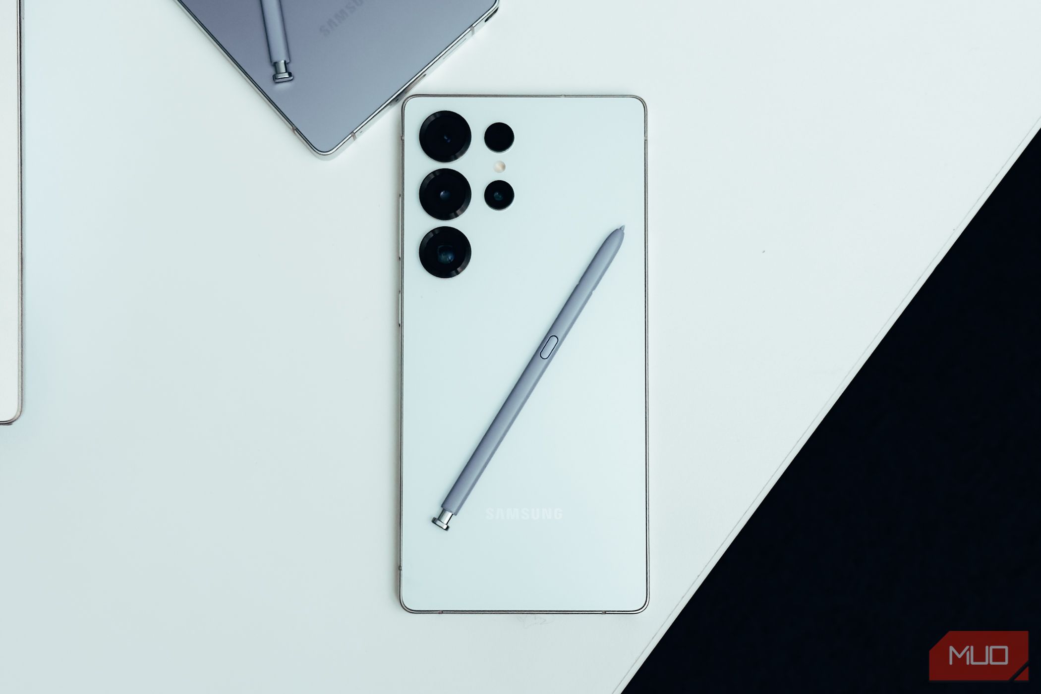 Samsung Galaxy S25 Ultra in white on white table.