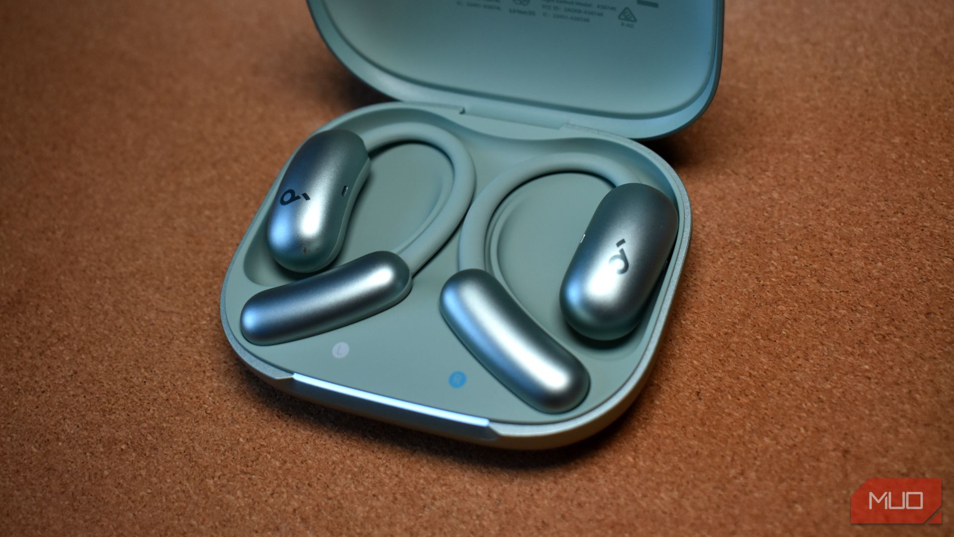 soundcore aerofit 2 case with earbuds close up.