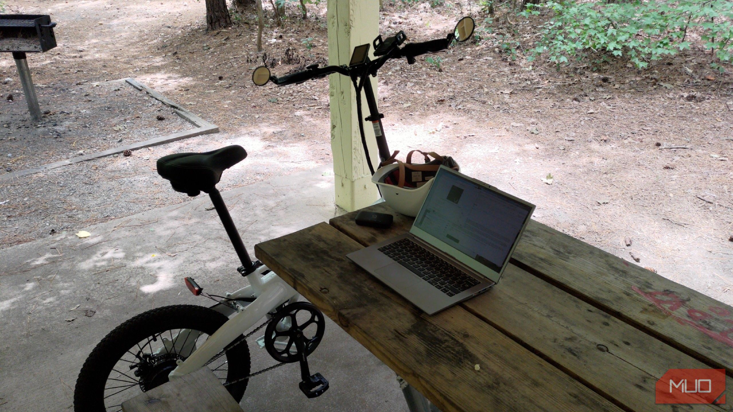 Clevo laptop next to an ebike.