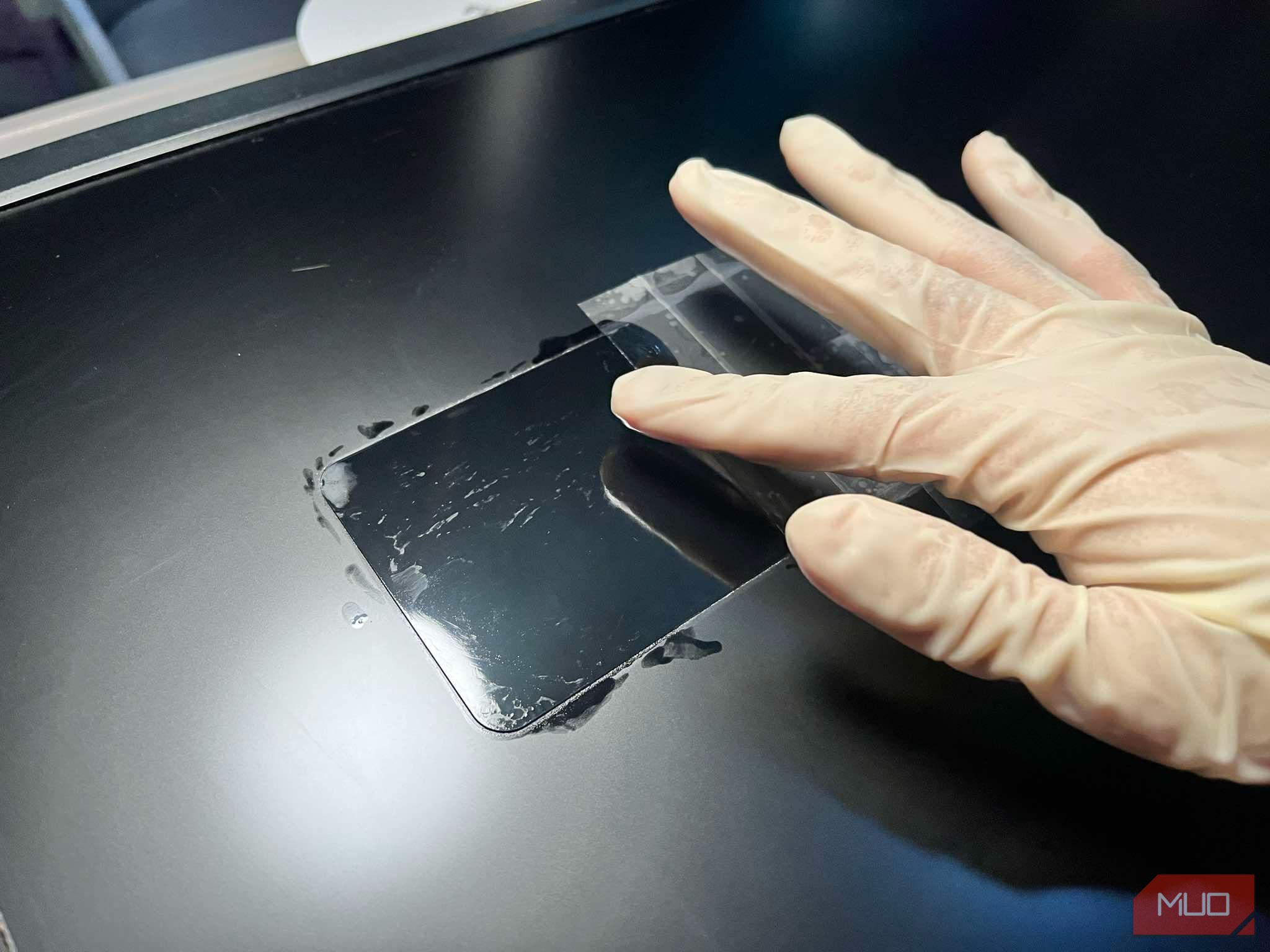 Applying ceramic coating with a latex glove