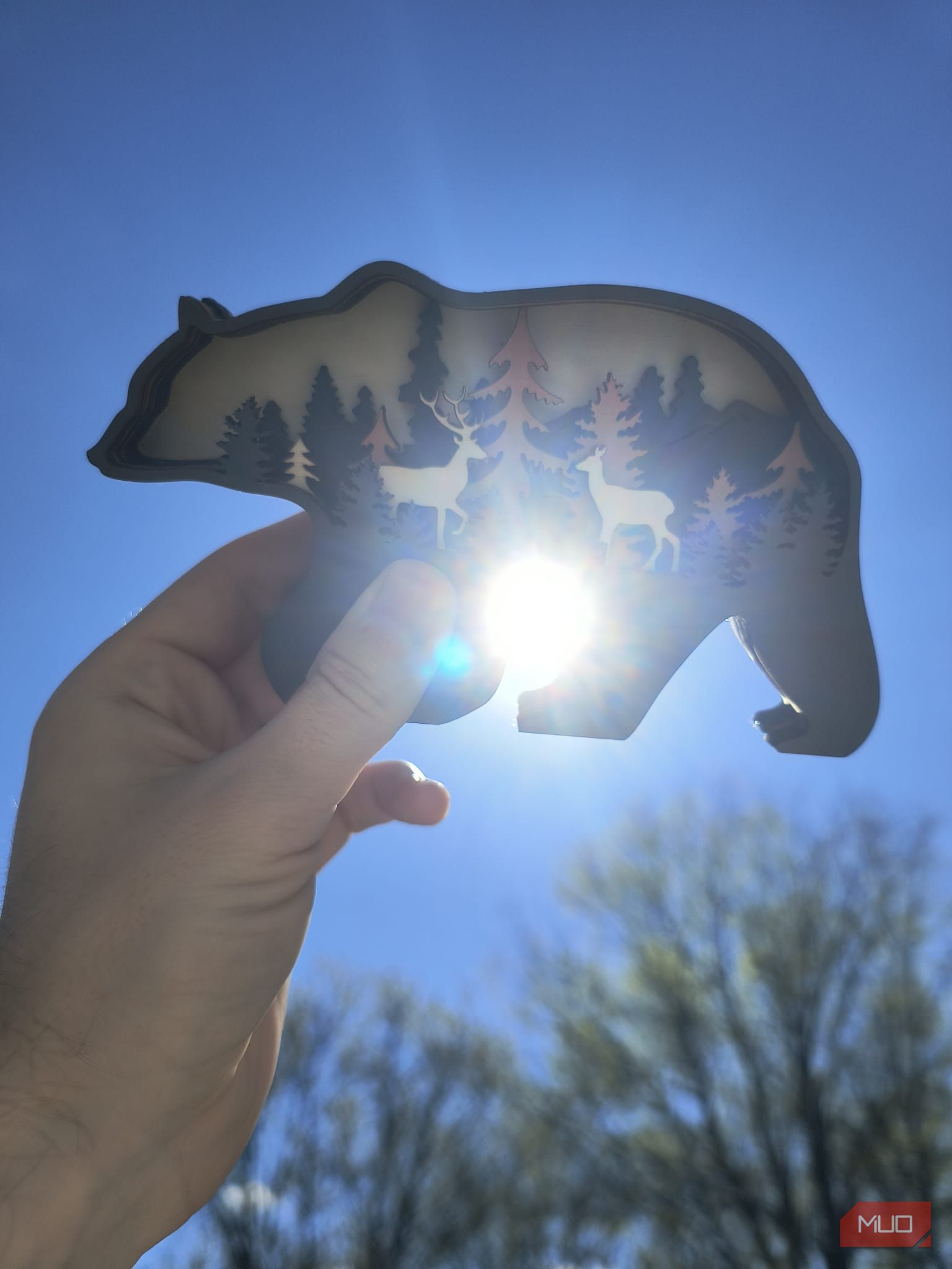 A bear decoration with the sun poking through its legs—HDR disabled