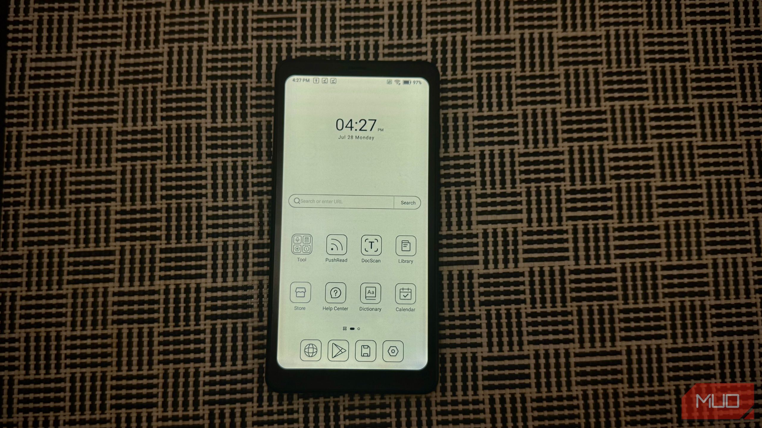 Boox Palma 2 on a table with its home screen displayed