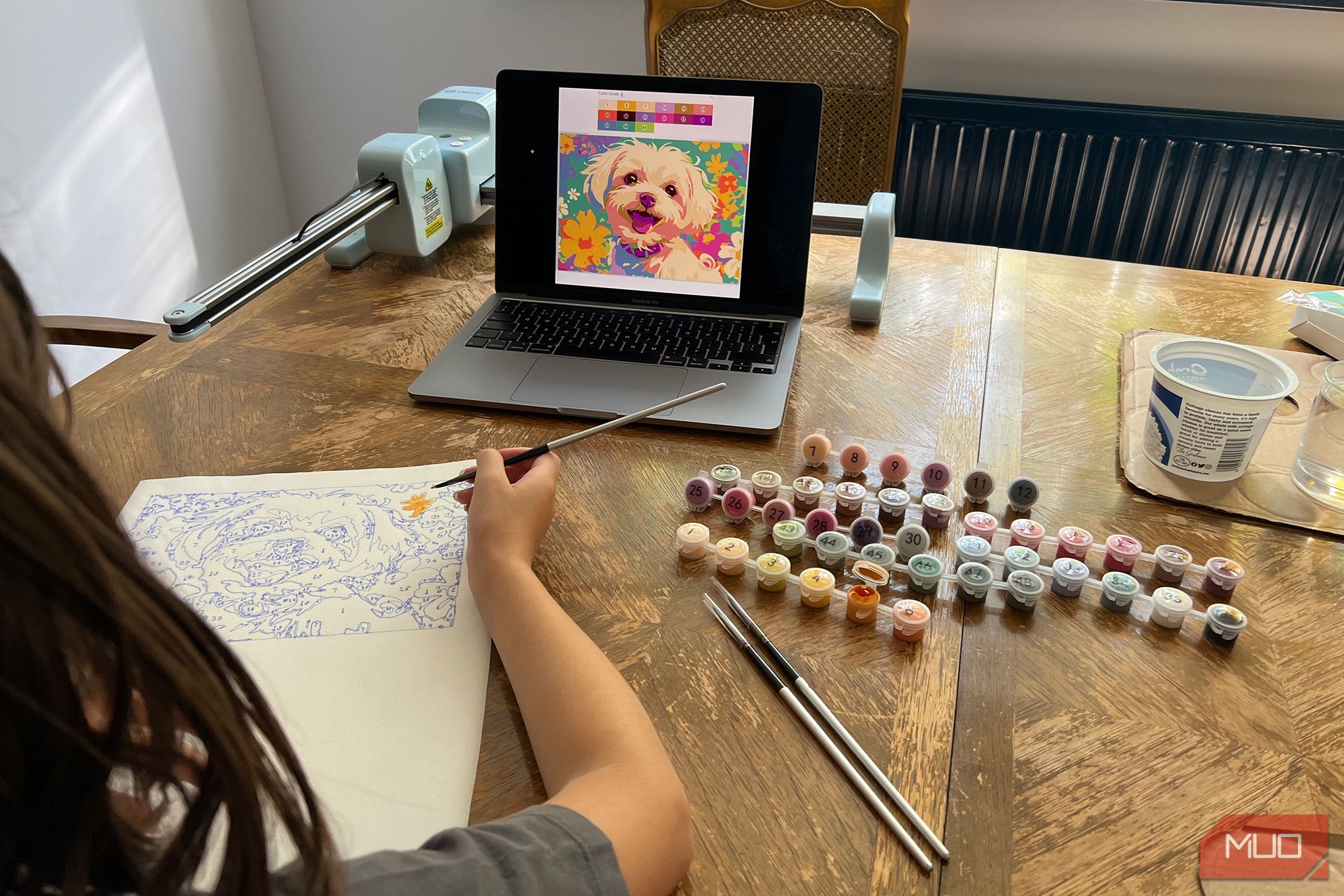 Child painting a LOKLiK Paint By Numbers Dog Image