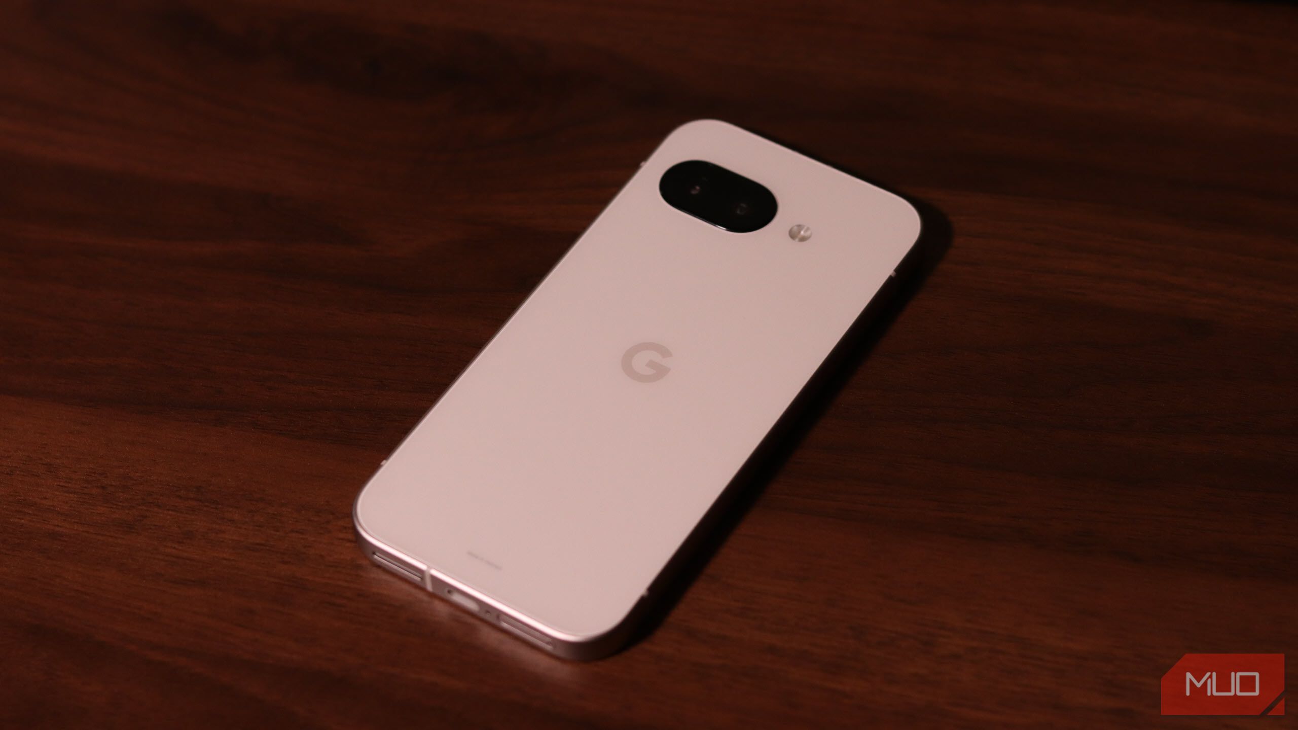 Pixel 9a on a wood surface