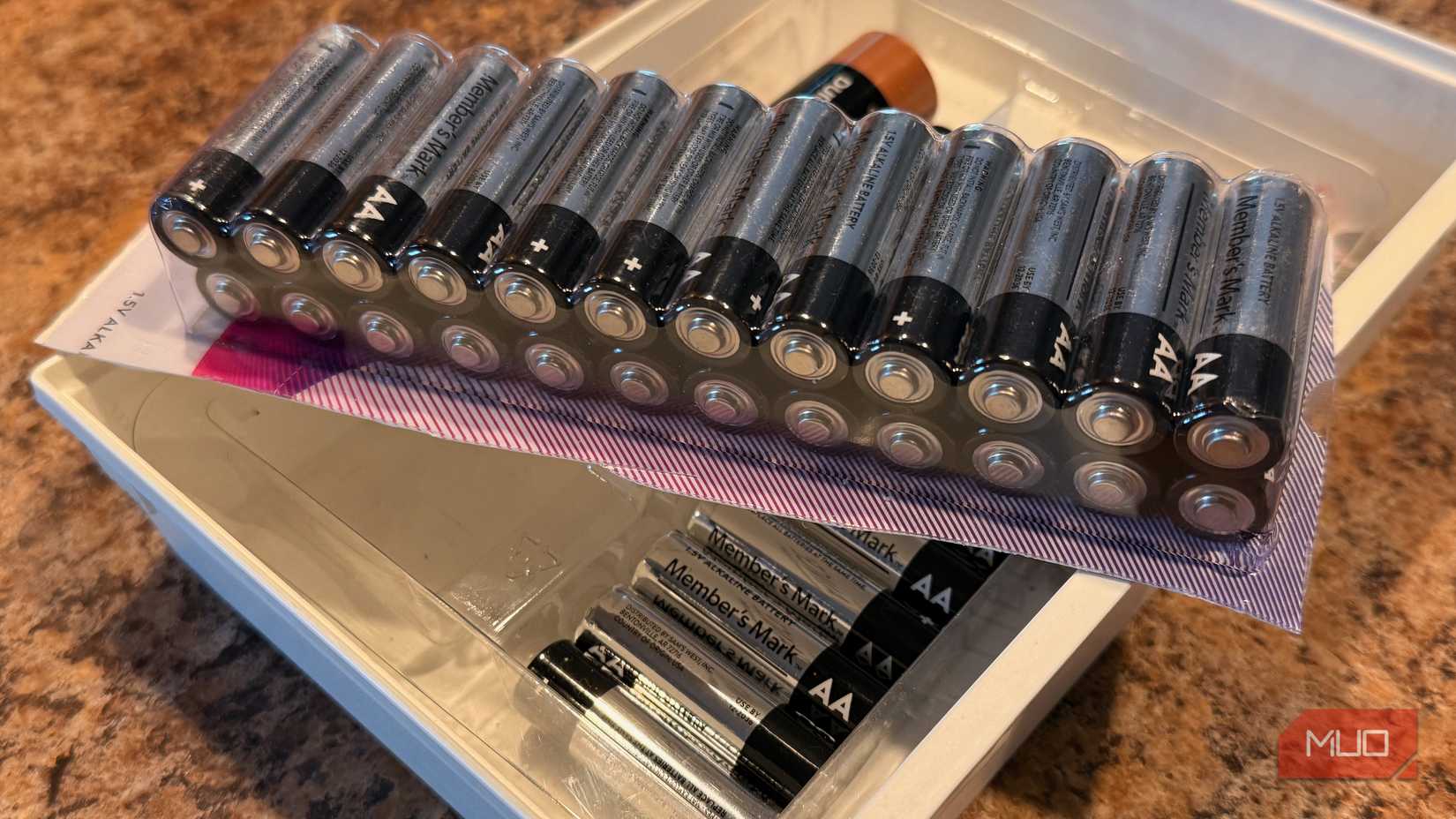 A storage area for batteries. 