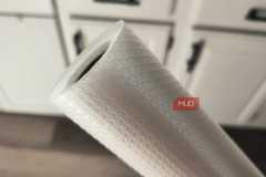 Close up end shot of a plastic liner roll