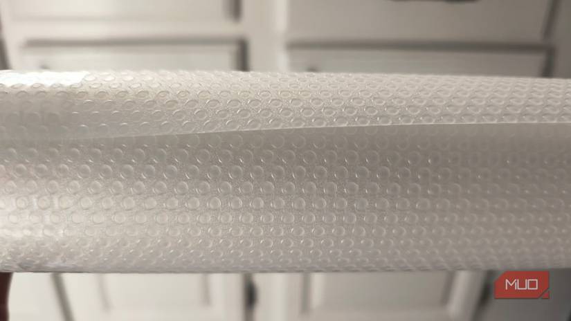 Close up side view of a plastic liner roll