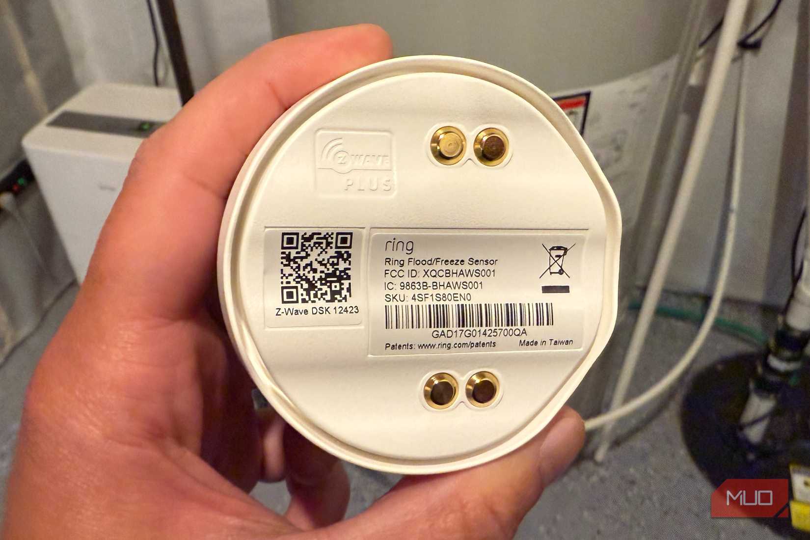 bottom view of ring flood and freeze sensor showing water contacts