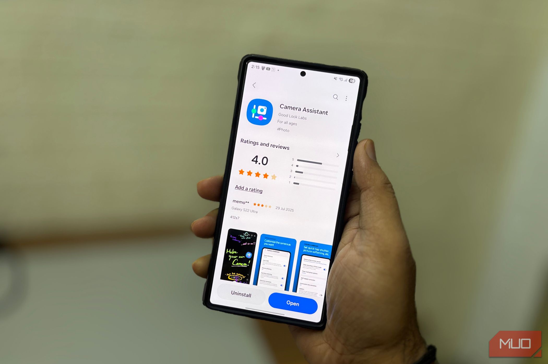 Hands holding Samsung phones showing camera assistants in Galaxy stores