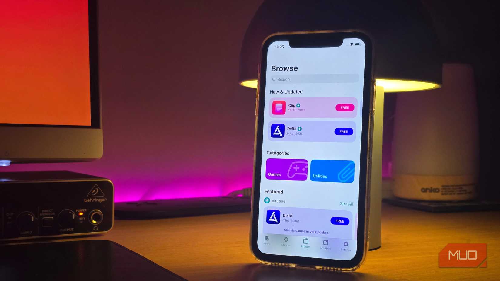 iPhone on a table running AltStore