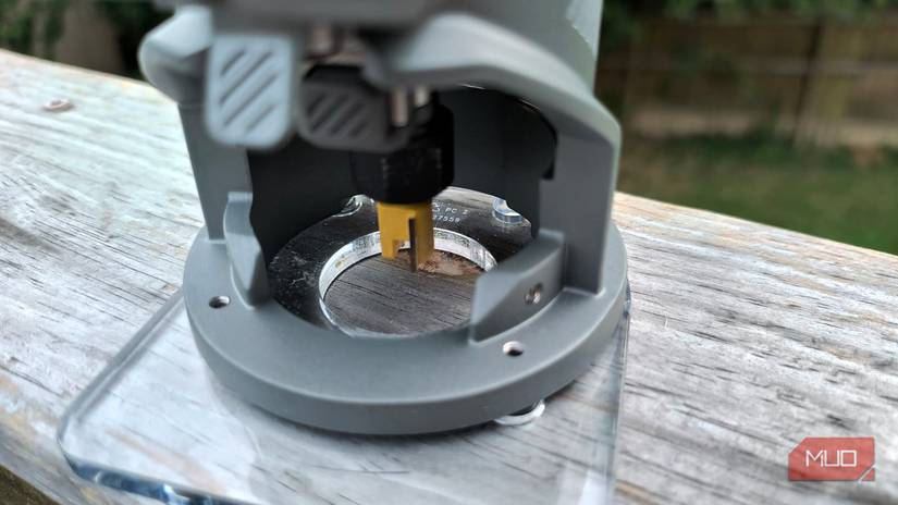 A router bit attached to the inside of a router