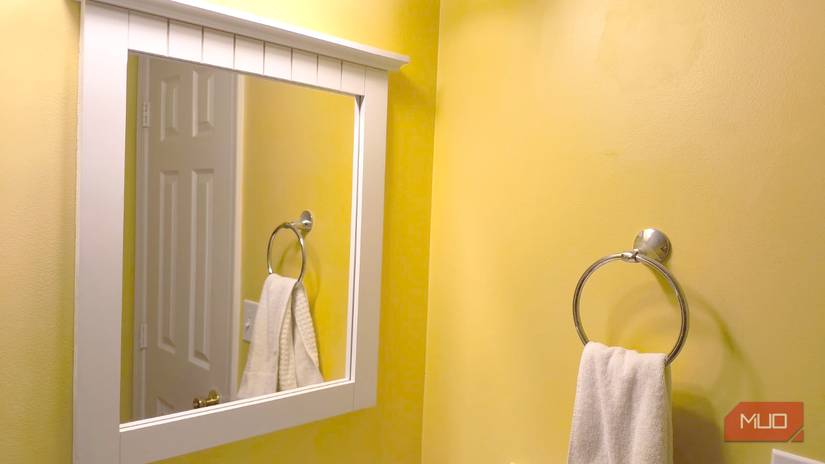 A streak-free mirror, cleaned with vinegar and newspaper